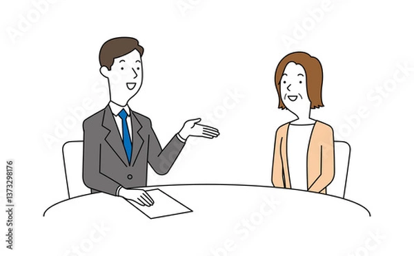 Obraz 男性の相談員にアドバイスを聞く高齢の女性