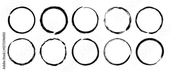 Fototapeta Round paint brush strokes set. Black grunge round stains collection. Ink or charcoal circular frames bundle for logo, label, poster, banner. Rough ring stamp mark pack. Vector encircle design elements