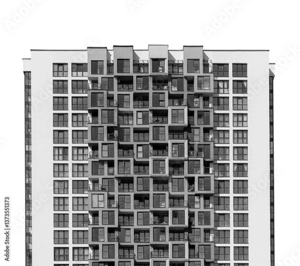 Obraz Building with modern architecture. Tall highrise office, commercial or residential property with glass facade, window details and outdoor view for real estate and investment. Isolated on white..