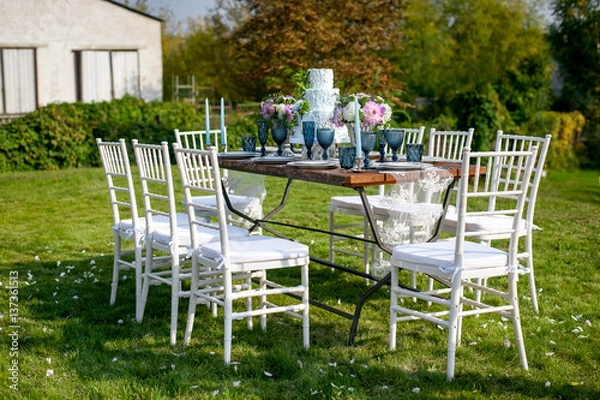 Fototapeta Decorated table with candles