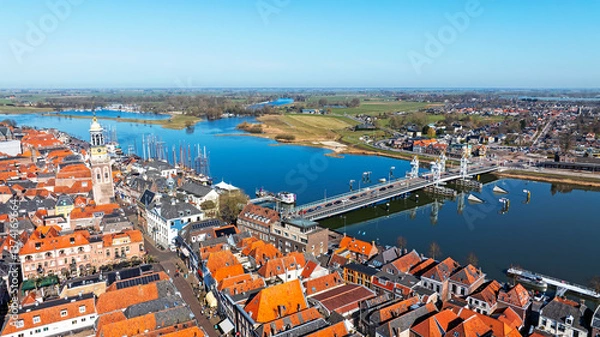 Fototapeta Aerial from the historical city Kampen at the river IJssel in the Netherlands
