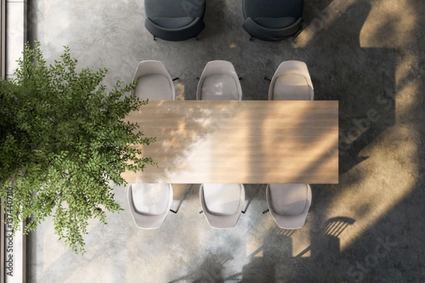 Obraz Top view of modern loft style dining room with empty wooden top table for copy space 3d render, There are concrete floor, sunlight shining into the room.