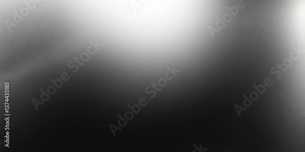Fototapeta Blurry gray gradient with dark grainy transitions between black and white, offering a minimalistic abstract background with a soft, modern feel.