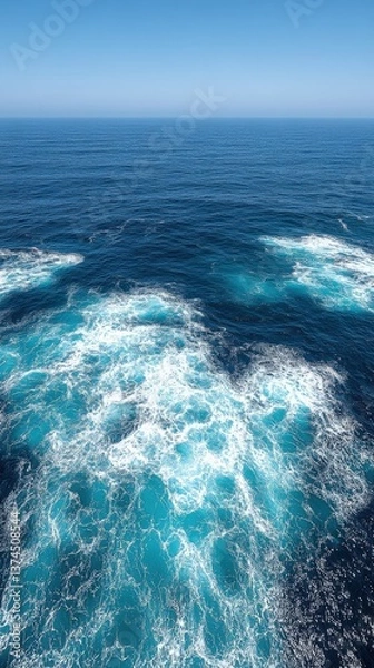 Fototapeta Stunning aerial view of ocean waves crashing, creating a mesmerizing turquoise and white pattern. Perfect for travel, nature, or serenity themes.