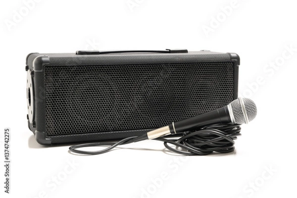Fototapeta A microphone with cord and speaker on a white background