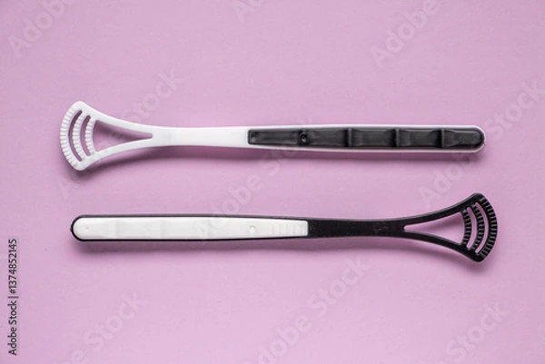 Obraz Two tongue brushes. Dental and oral care. Flat lay, top view.