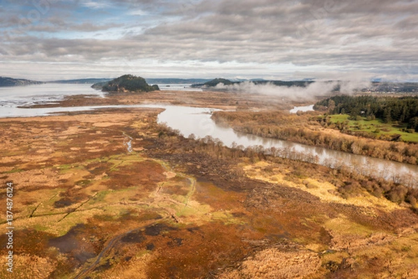 Obraz Aerial drone view of the North Fork of the Skagit River delta area. Hiking trails and bird watching make this a destination for nature lovers in this beautiful area of the Skagit Valley, Washington.