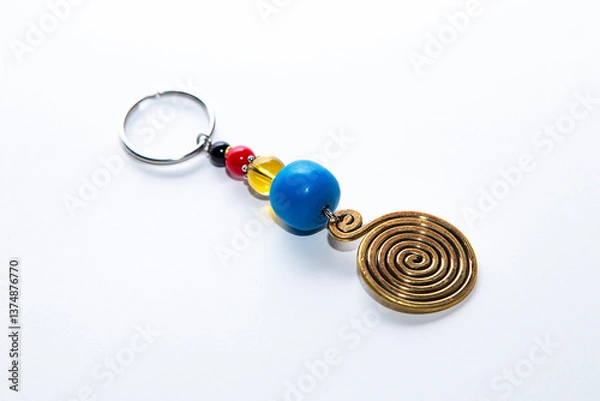 Fototapeta Handcrafted keychain with great detail and white background, colours	
