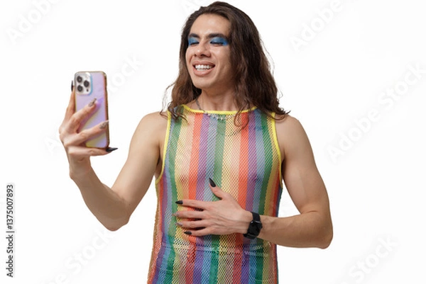Obraz Genderqueer person takes a selfie wearing pride clothing, smiling and posing happily for the camera.