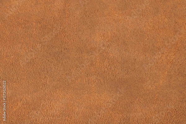 Fototapeta Natural light brown suede texture. Genuine shammy-leather with slight shabby texture, pattern or background, close-up, high resolution.