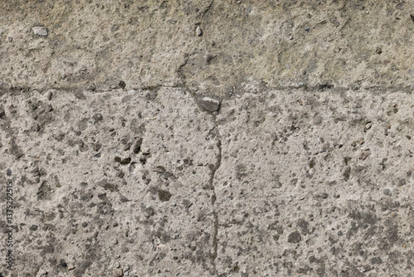 Fototapeta Background of destroyed concrete path, gray concrete, concrete texture, close-up. Natural photo. Old concrete slab