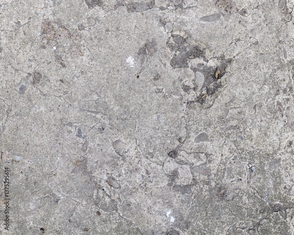 Fototapeta Background of destroyed concrete path, gray concrete, concrete texture, close-up. Natural photo. Old concrete slab