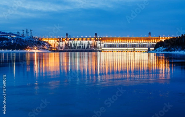 Fototapeta View of a hydroelectric dam on a river, long exposure photography at dusk