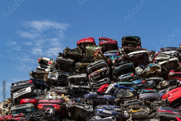 Fototapeta Stacked cars at a Amsterdam junkyard in the Netherlands.