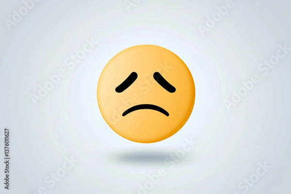Fototapeta A melancholic yellow emoticon conveying feelings of sadness and disappointment, with a soft shadow against a simple light gray background.
