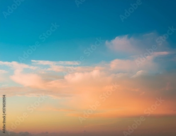 Obraz  blurred of cloud background with a pastel colored orange to blue gradient. 