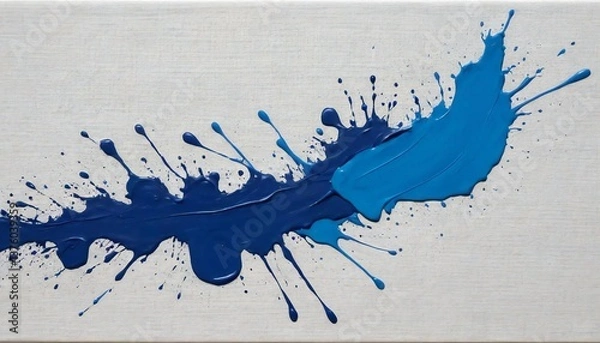 Fototapeta Dynamic blue paint splashes create a striking abstract composition on a light canvas background