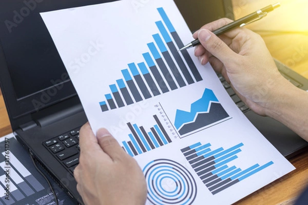 Fototapeta businessman hand working with new modern computer and business strategy as concept