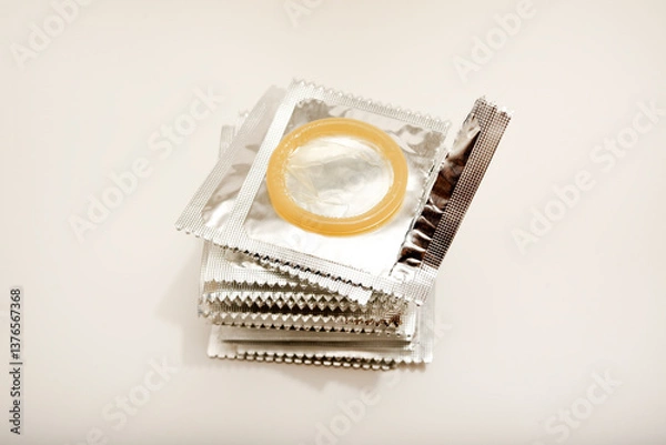 Obraz An open condom in a package. Male contraceptives.