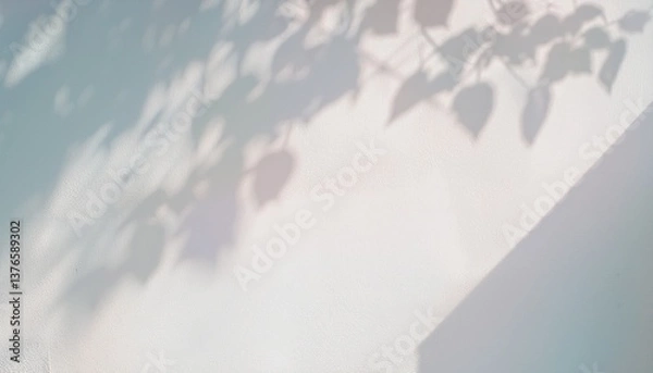 Fototapeta  high-resolution abstract image of soft natural tree leaves casting delicate shadows on a white wall background. The organic shapes create a calming, minimalist aesthetic with subtle variations in lig