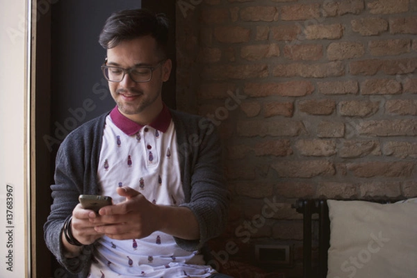 Obraz Checking the phone