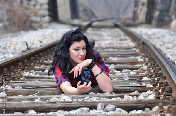 Obraz Girl Taking Selfie On railway, Girl make selfie on railroad