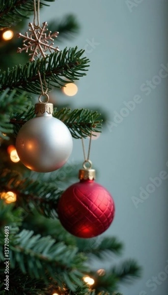 Fototapeta Christmas tree ornaments hanging from a metal snowflake background, holiday ornaments, wintery landscape, winter wonderland