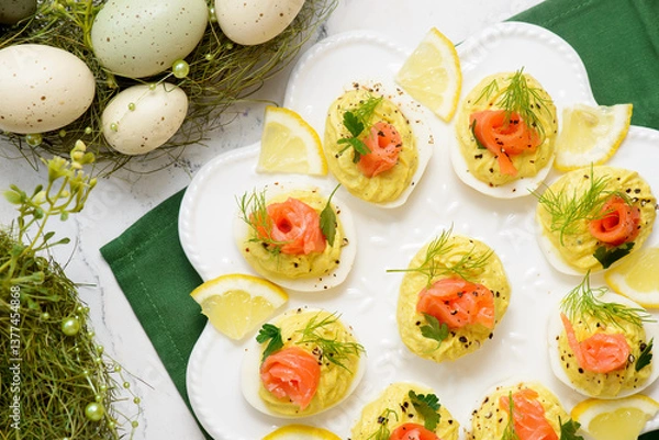 Obraz Easter deviled eggs with horseradish and smoked salmon..top veiw