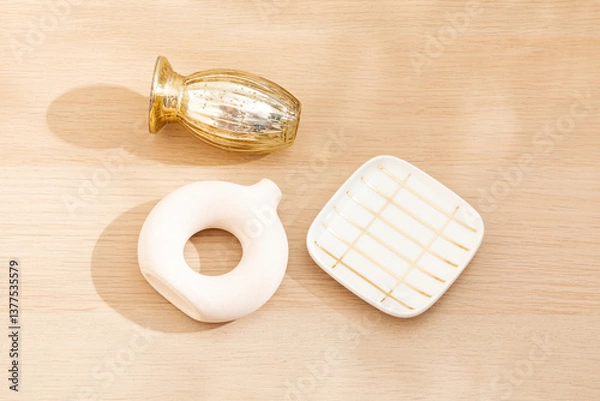 Obraz Copy space warm lighting background.Blank wallpaper with minimalist vase.Light and Shadow. Space for text.Backdrop.Studio photography.Sunshine. Chic style. Vase isolated on wooden. Home decor. Clean.