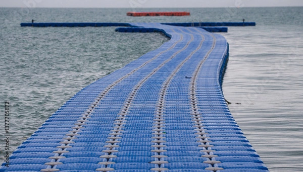 Fototapeta Plastic and wooden floating walk way floating in the sea in Island,Krabi,Thailand