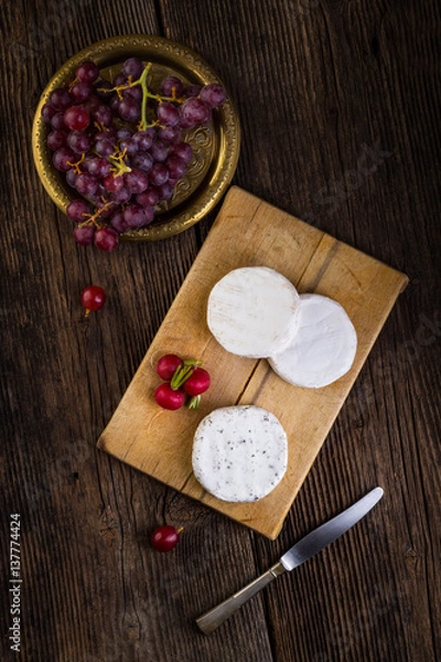 Obraz Cheese with white mold, grapes and radish