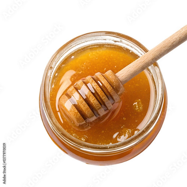 Fototapeta Golden Honey Dripping from Wooden Dipper into Glass Jar – Viscous Texture Close-Up

