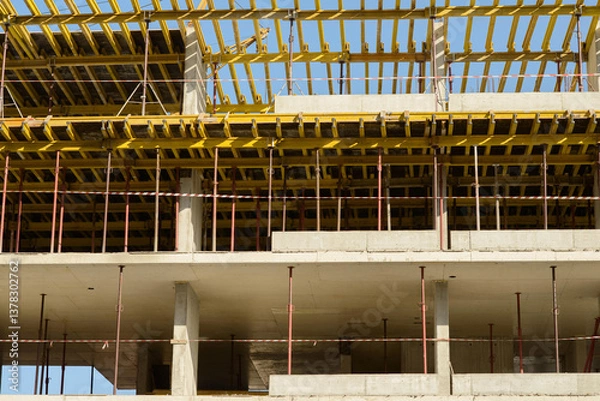 Fototapeta Modern Building Under Construction Featuring Concrete and Scaffolding