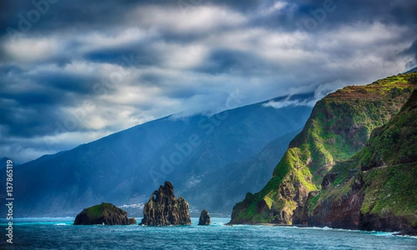 Obraz Black rocks in the ocean and coastline of Madeira island
