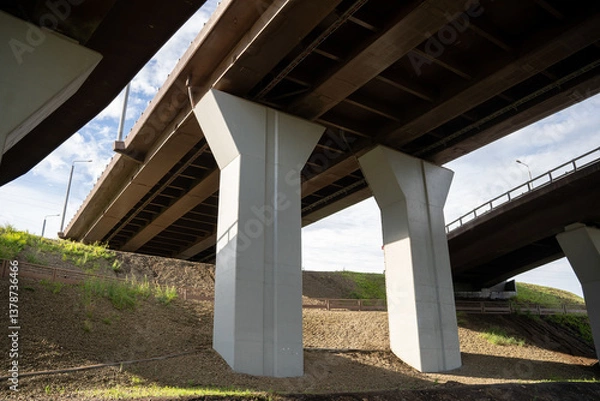 Fototapeta Large concrete support columns for a bridge or elevated roadway