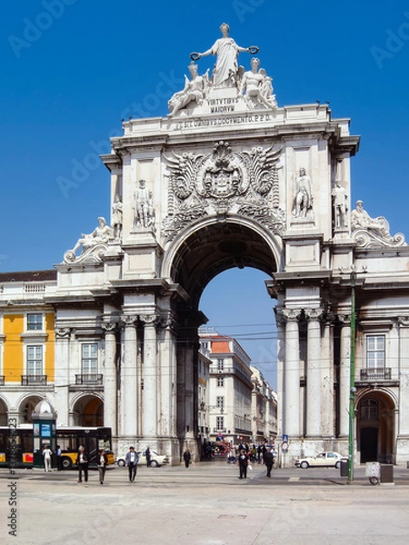 Fototapeta Lisbon, Portugal. Iconic Rua Augusta Street Triumphal Arch in Praca do Comercio Square or Terreiro do Paco. 18th Century neoclassical