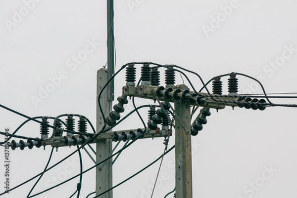 Fototapeta Power Lines and Utility Poles in Urban Setting