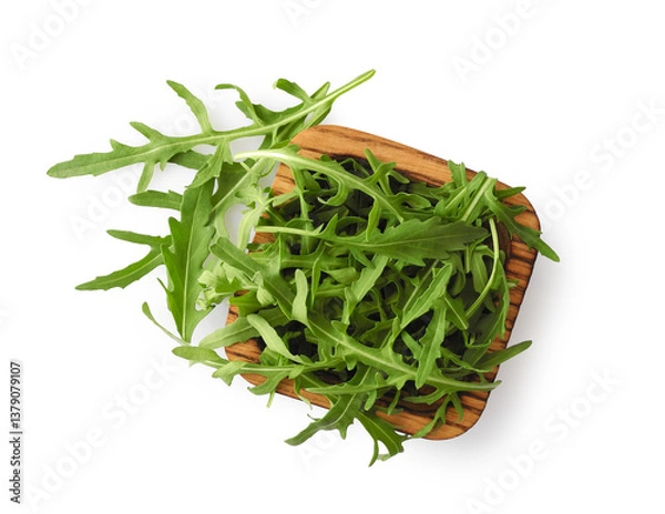Obraz Fresh arugula leaves in square wooden bowl isolated on white background top view. Leaf vegetable for diet and healthy eating.