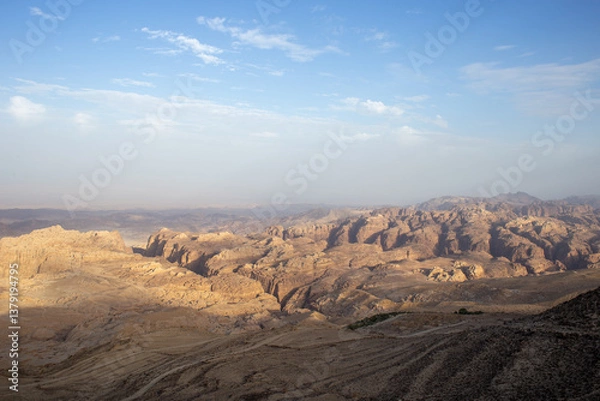 Fototapeta The mountains in the Wadi Rum desert are red, where many films were shot such as the Martian, Transformers, the desert where there is nothing, the drought. ecology , dust and red sand