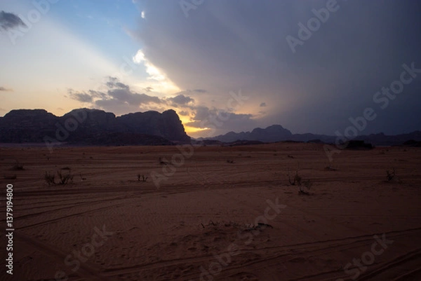 Fototapeta The mountains in the Wadi Rum desert are red, where many films were shot such as the Martian, Transformers, the desert where there is nothing, the drought. ecology , dust and red sand
