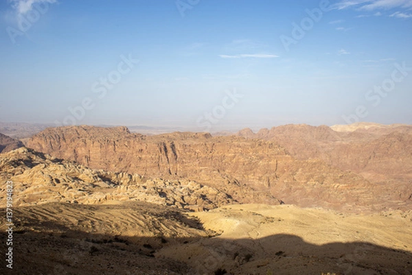 Fototapeta The mountains in the Wadi Rum desert are red, where many films were shot such as the Martian, Transformers, the desert where there is nothing, the drought. ecology , dust and red sand