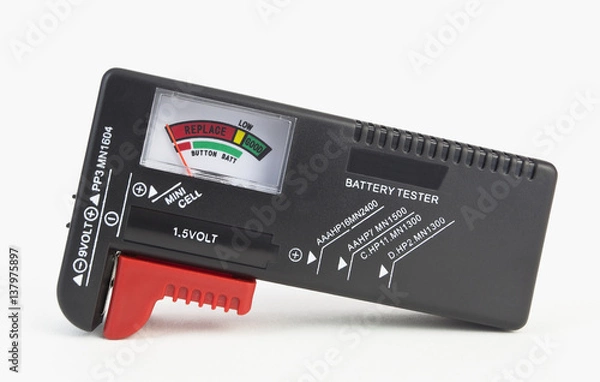 Obraz Inexpensive portable battery tester.I Isolated.