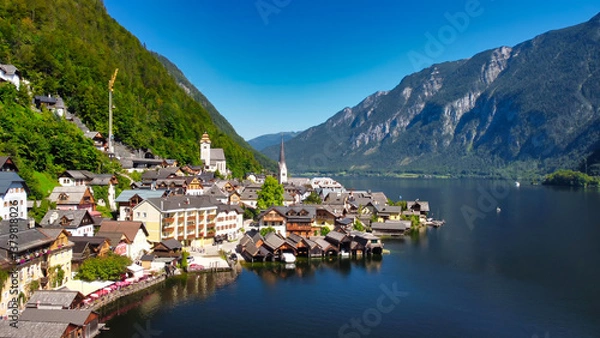 Fototapeta Stunning aerial view of Hallstatt, showcasing the picturesque village and serene lake nestled in the Austrian Alps