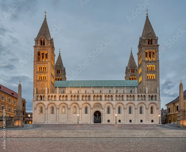 Fototapeta Sts. Peter and Paul's Cathedral Basilica in Pécs with illuminated towers