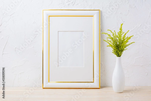 Fototapeta Gold decorated frame mockup with ornamental grass in exquisite vase