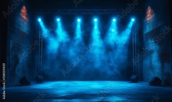 Fototapeta an empty stage bathed in blue light, with beams of light shining down and a smoky atmosphere, creating a dramatic and mysterious feel. It is a perfect setting for performances and events