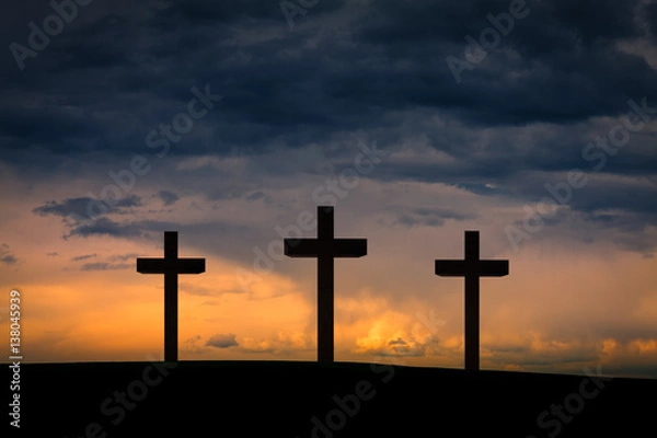 Obraz Jesus Christ cross between two crosses on Golgota Mountain, on  blue, orange, purple sky with dramatic clouds,light,sunset, twilight, dusk. Easter, Crucifixion, resurrection, Good Friday concept 