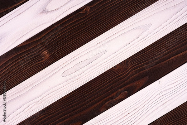 Fototapeta Alternating dark brown and white wooden planks with natural wood grain texture, rustic background for design and print