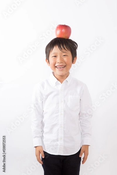Obraz 頭にりんごを乗せる少年