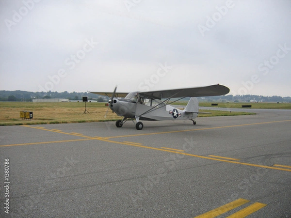 Fototapeta silver plane taking off
